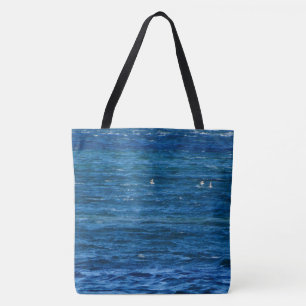 Sailing Gulls Over The Bay on a Tote Bag