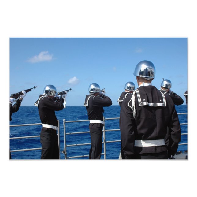 Sailors fire a gun salute during a burial-at-se photo print (Front)