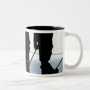 Sailors sweep out the hangar bay Two-Tone coffee mug