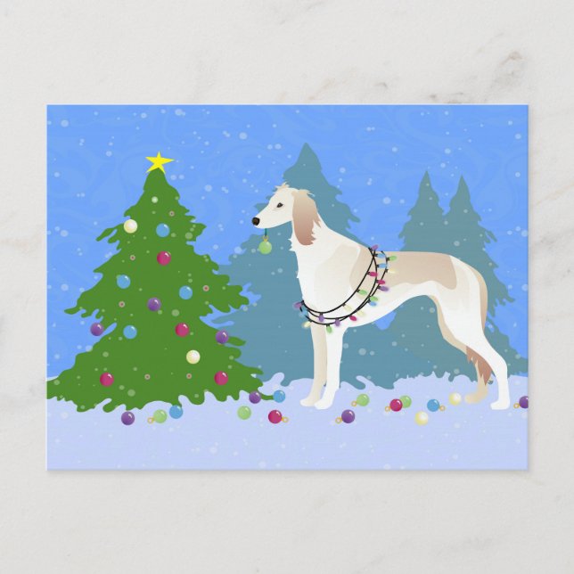 Saluki decorating a Christmas tree in the forest Holiday Postcard (Front)