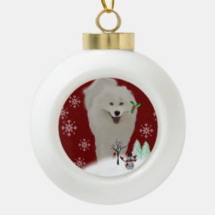 Samoyed in a Snow Theater Ceramic Ball Christmas Ornament