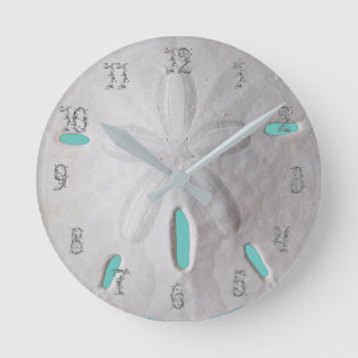 Sand dollar ocean beach white turquoise round clock