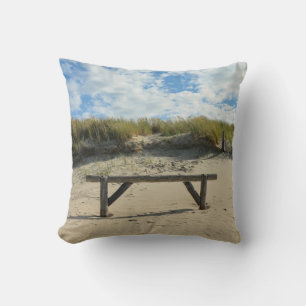 Sand dunes with wooden fence cushion