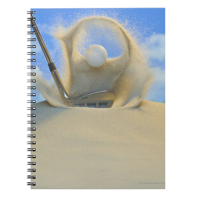 sand wedge hitting a golf ball out of a sand 2 notebook (Front)