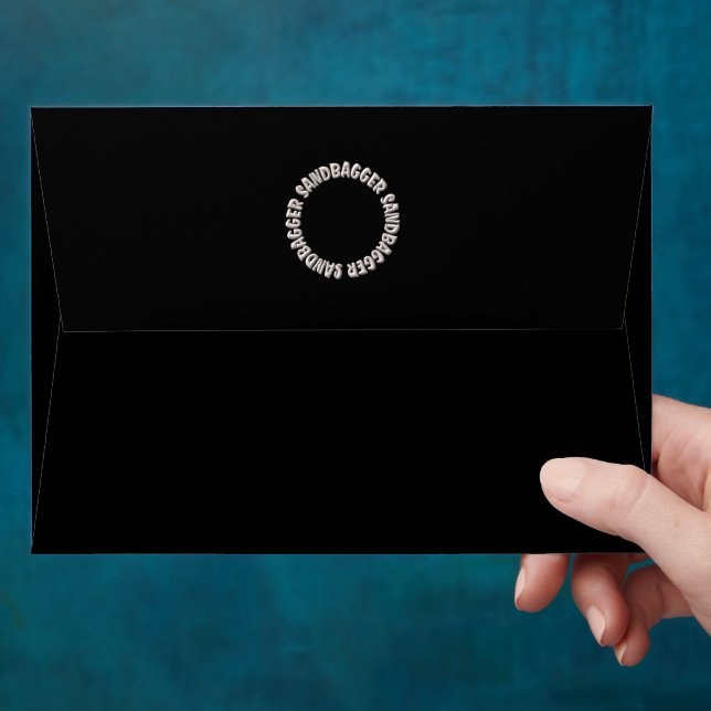 Sandbagger black sands standard envelopes back (Hand)
