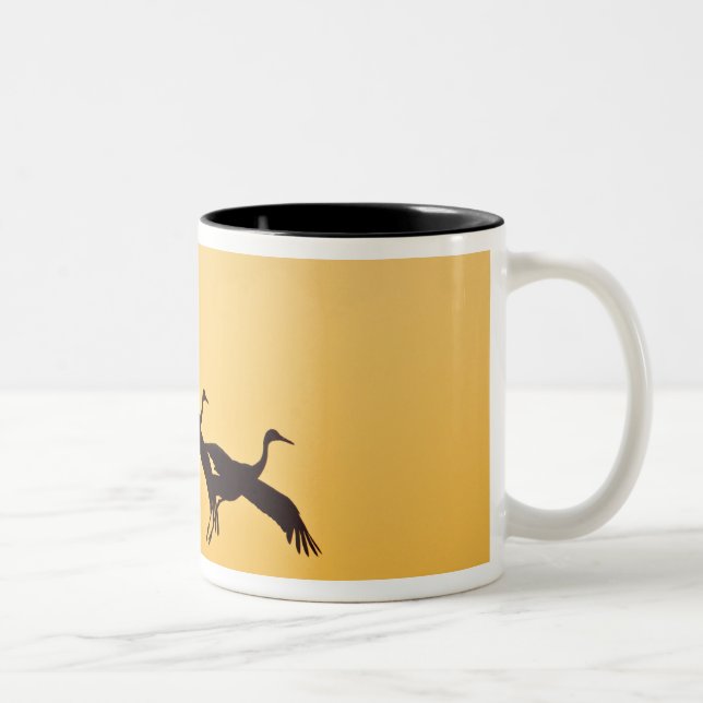 Sandhill Crane landing at sunset Two-Tone Coffee Mug (Right)