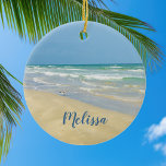 Sandpiper on the Seashore | Beautiful Beach Custom Ceramic Tree Decoration<br><div class="desc">Beautiful beach ornament with gorgeous seaside photography featuring a pretty sandpiper standing at the edge of the ocean waves on a sunny summer day. Lovely blue green water waves roll onto the sandy shore where your name is personalized in cute teal typography. A beautiful Christmas gift for a daughter, mom,...</div>