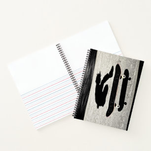 sandwiched skateboard notebook