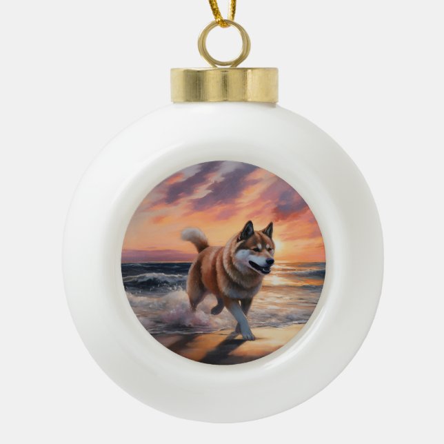 Sandy Paws Akita Dog on Beach Sunset Ceramic Ball Christmas Ornament (Front)