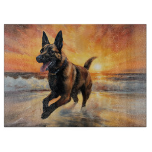 Sandy Paws Belgian Malinois Dog on Beach Sunset  Cutting Board