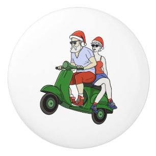 Santa and Mrs. Claus riding a scooter Ceramic Knob