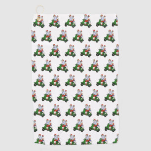 Santa and Mrs. Claus riding a scooter Golf Towel