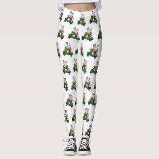 Santa and Mrs. Claus riding a scooter Leggings