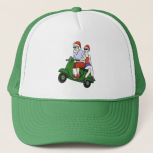 Santa and Mrs. Claus riding a scooter Trucker Hat