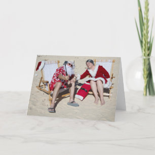 Santa and Mrs Claus taking selfie on beach Holiday Card