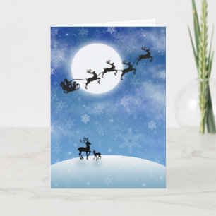 Santa and Reindeer Flying Full Moon Holiday Card