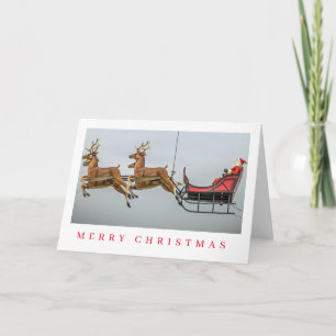 Santa and sleigh figurine view Christmas card