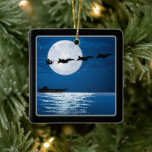 Santa and Super Hornets F-18 Jets Christmas Ceramic Ornament<br><div class="desc">This patriotic military holiday Christmas tree ornament features Santa Claus and his sleigh pulled by a team of F-18 Super Hornet jets. They are flying above an aircraft carrier in front of a full moon. Personalize the back with a name and year or any text that you wish to add....</div>