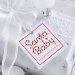 Santa Baby Red Baby Shower Favour Tag<br><div class="desc">Add a festive flourish to your holiday baby shower favours with this charming “Santa Baby” tag, featuring candy cane-striped lettering and a sweet red heart. Perfect for tying onto treat bags, party gifts, or keepsakes, this square tag brings playful Christmas cheer to your celebration. Customise with baby’s name and shower...</div>