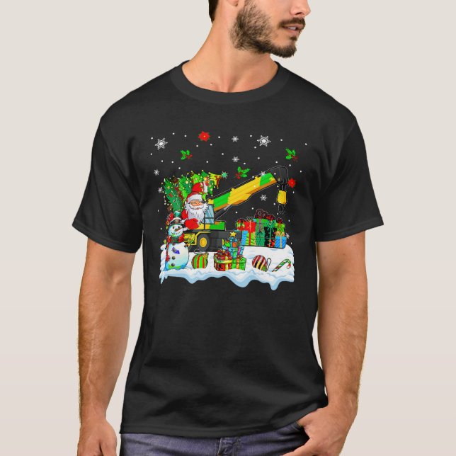 Santa Carrying Christmas Tree On Crane Truck Snowm T-Shirt (Front)