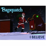 Santa Claus - Bagsquatch Photo Sculpture Magnet<br><div class="desc">Do you believe in Santa Claus? An image of Santa Claus along the lines of the striding Sasquatch from the Patterson-Gimlin film. Text reading "Bagsquatch" also appears along with customisable text reading "I BELIEVE." Bagsquatch, aka Bigbag, is an elusive, nocturnal figure generally only seen on one night in late December....</div>