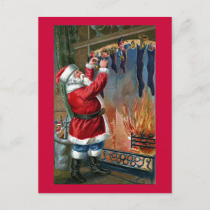 Santa Claus Busy Filling Stockings Holiday Postcard
