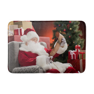 Santa Claus checking his list Bath Mat