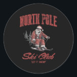 Santa Claus Christmas Snow Skiing At The North Le  Classic Round Sticker<br><div class="desc">Santa Claus Christmas Snow Skiing At The North Le Ski Club</div>