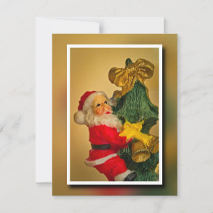 Santa Claus Climbing the Christmas Tree - Vintage Card