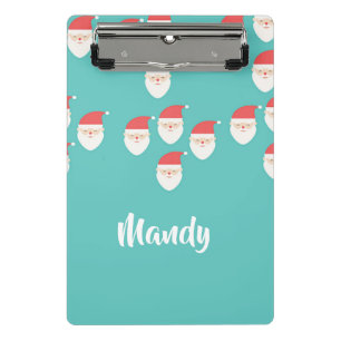 Santa Claus faces on blue Mini Clipboard