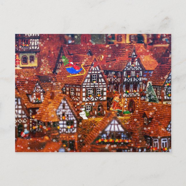 Santa Claus Flying Over a Gingerbread Village Postcard (Front)