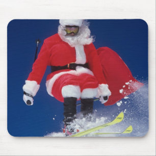 Santa Claus on skis jumping off a cornice at Mouse Mat