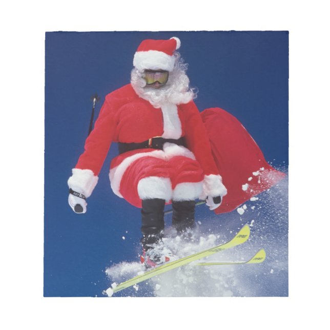 Santa Claus on skis jumping off a cornice at Notepad (Front)
