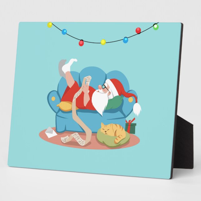 Santa Claus on the couch in pyjamas Plaque (Side)