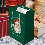 Santa Claus Personalised Green Kids Christmas Medium Gift Bag<br><div class="desc">Customise this nostalgic from Santa Claus green gift bag with your own personalised text with your kids name in white script. This beautiful old fashioned drawing of Santa's red hat and white beard are the perfect holiday present bags for your children's presents under the tree on Christmas day.</div>