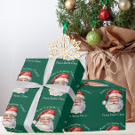 Santa Claus Personalised Green Kids Christmas Wrapping Paper<br><div class="desc">Customise this nostalgic from Santa Claus green wrapping paper with your own personalised text with your kids name in white script. This beautiful old fashioned drawing of Santa's red hat and white beard are the perfect holiday stickers for your children's presents under the tree on Christmas day.</div>