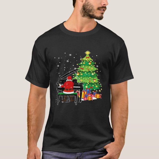 Santa Claus Play Piano Nearby Christmas Tree Funny T-Shirt (Front)