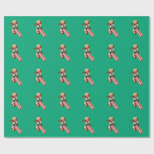 Santa Claus plays on candy can slide for fun. Wrapping Paper