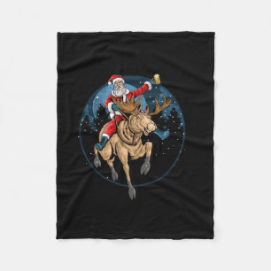santa claus rides a christmas reindeFleece Blanket