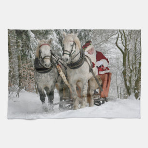 Santa Claus rides in a Horse sleigh Tea Towel