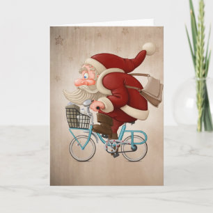 Santa Claus rides the bicycle Holiday Card