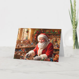Santa Claus Working in his Christmas Toy Workshop  Holiday Card