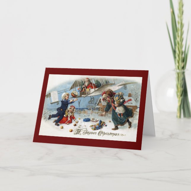 Santa Delivering Gifts Via Biplane Holiday Card (Front)