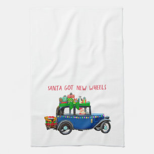 Santa Driving a Car Tea Towel