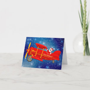 Santa Flying Biplane Christmas Greeting Card