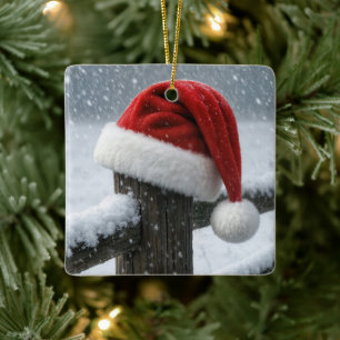 Santa Hat On a Snowy Fence Post Ceramic Ornament