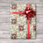 Santa Hat Rottweiler Dog Christmas Holly Wrapping Paper<br><div class="desc">A portrait of a beautiful Rottweiler Dog wearing a red and white Santa Claus hat is the feature in the pattern on this Holiday gift wrapping paper. The portrait is placed on a background of green holly leaves and red berries. Celebrate Christmas the Rottweiler way!</div>