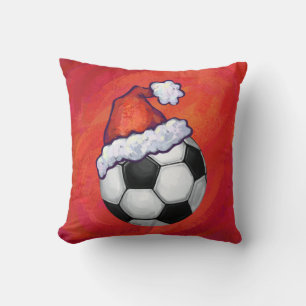 Santa Hat Soccer Ball on Red Cushion