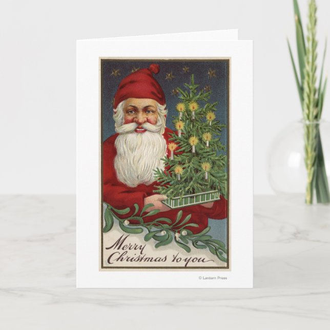 Santa Holding a Candlelit Tree Holiday Card (Front)