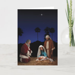 Santa Kneeling at Nativity Holiday Card
